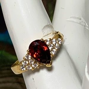 Garnet colored CZ ring,  size 10. (JW070)